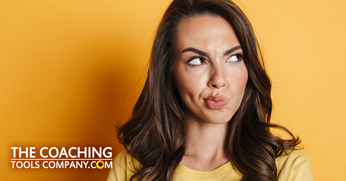 Client Pondering Limiting Beliefs on Yellow Background