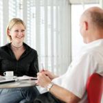 life coaching exercises image - woman coaching man in office