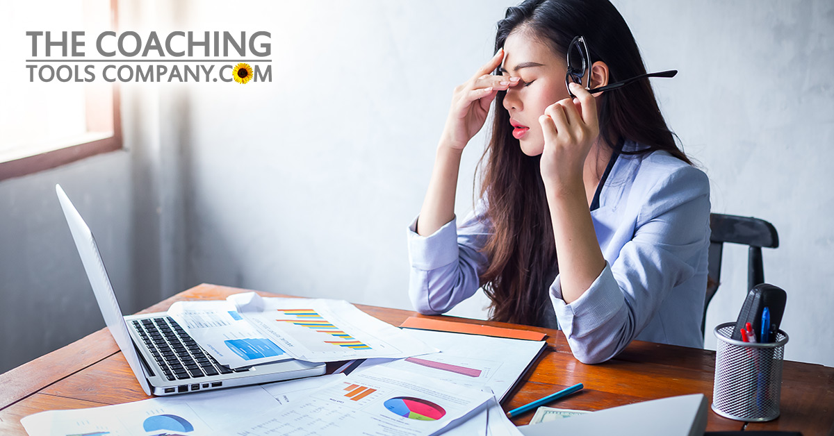 Stressed Person at Desk