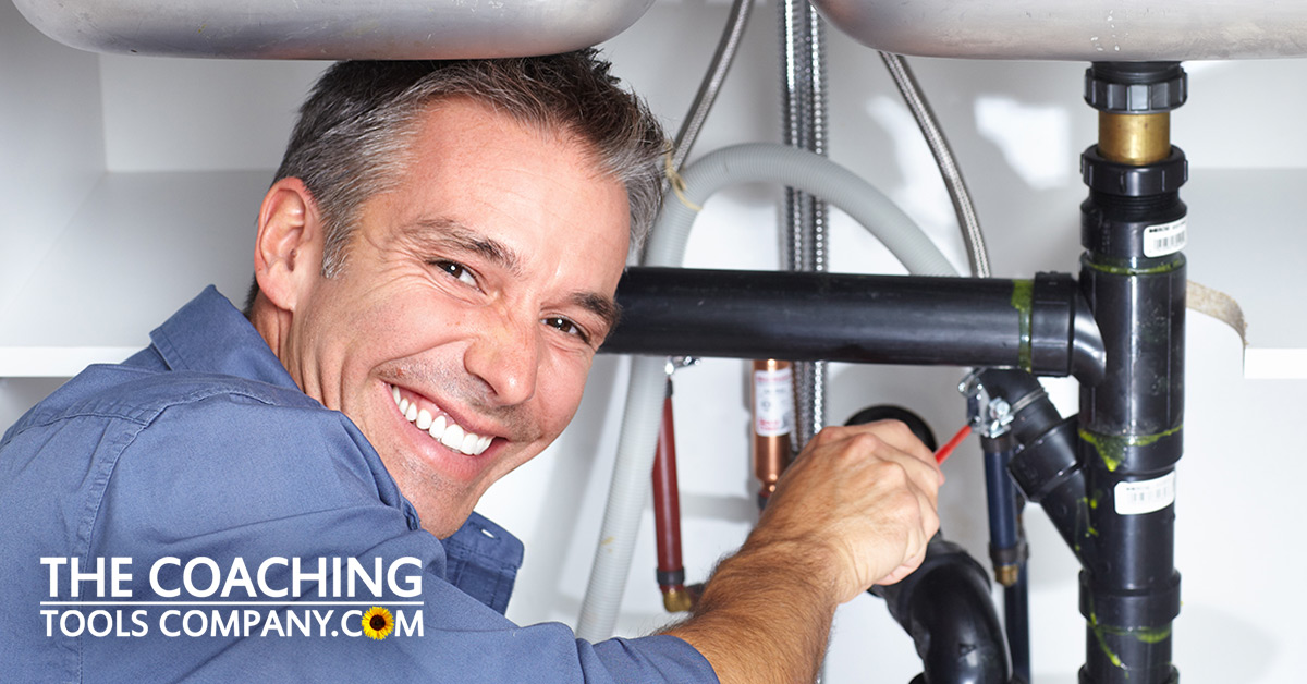 Plumber Fixing Sink