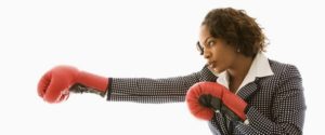 woman-with-boxing-gloves-medium-599x250