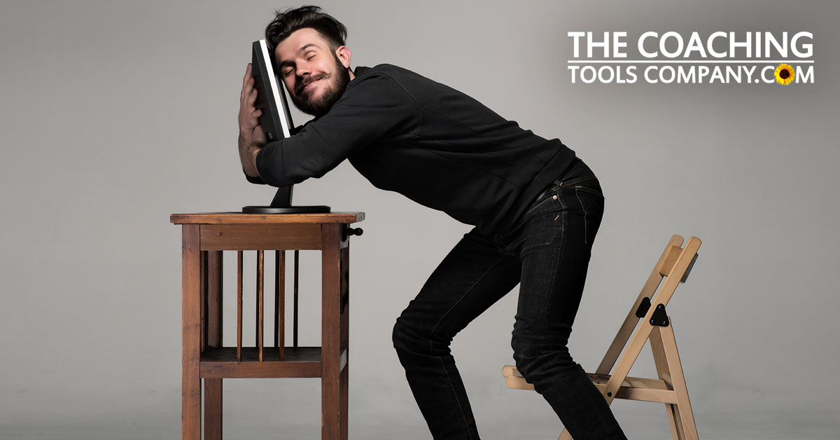 Man Hugging Computer