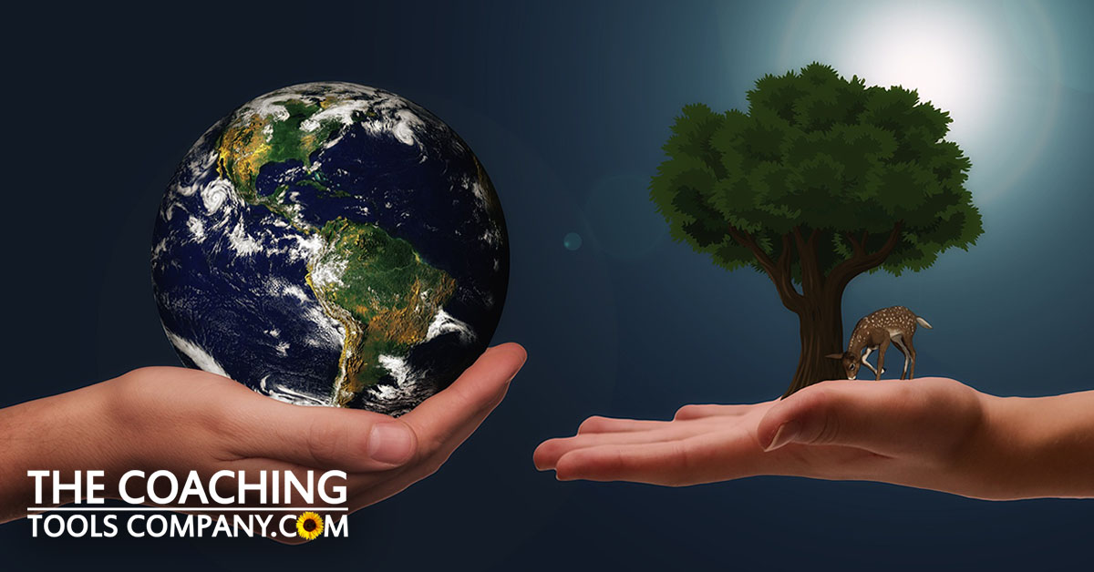Two Hands With Earth and Tree for Voluntary Simplicity