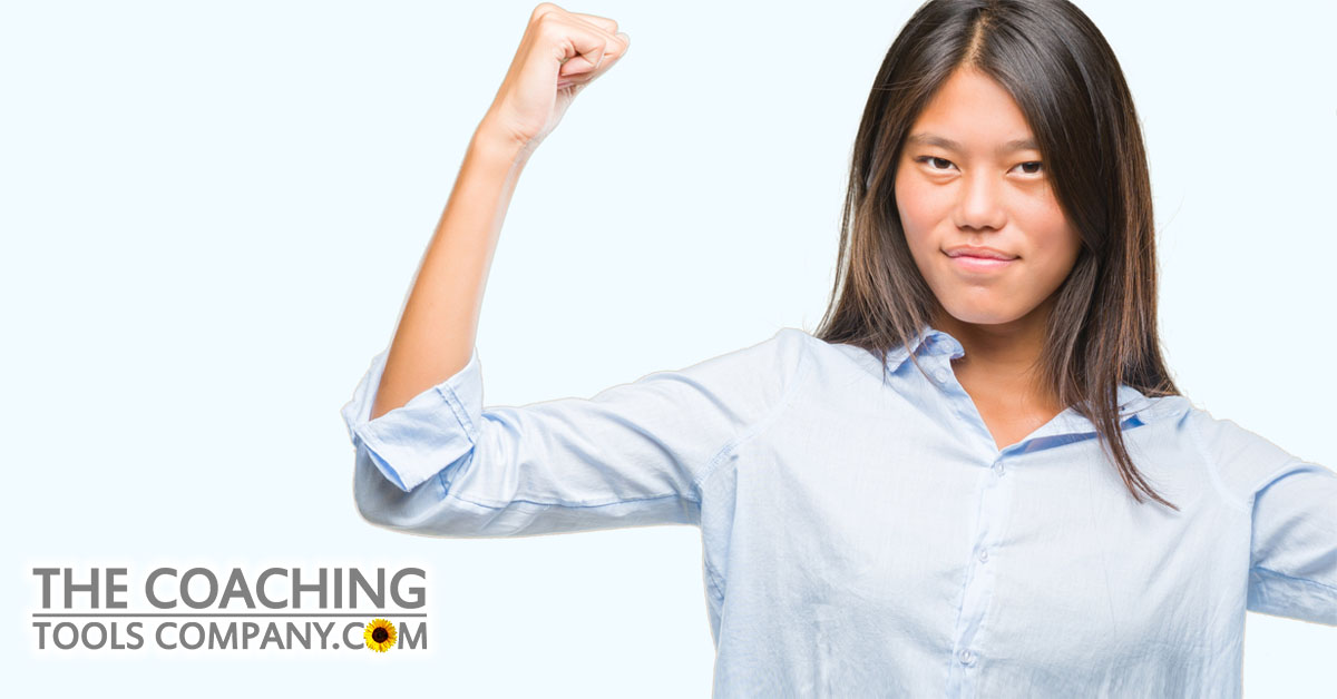Balanced Body Budget shown by strong healthy client with arm raised