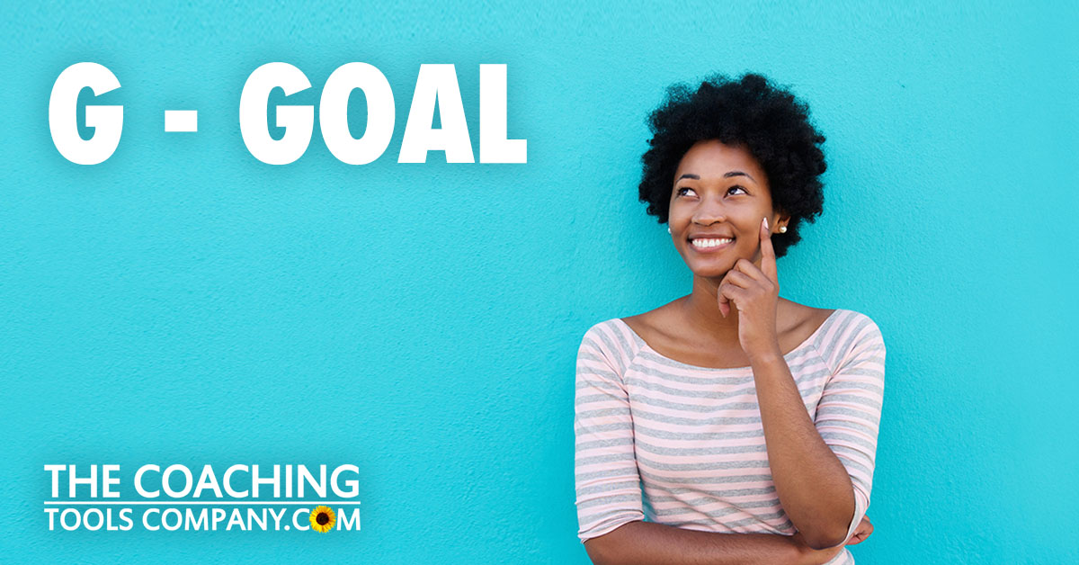 GROW model goal setting with happy woman looking up and contemplating goals