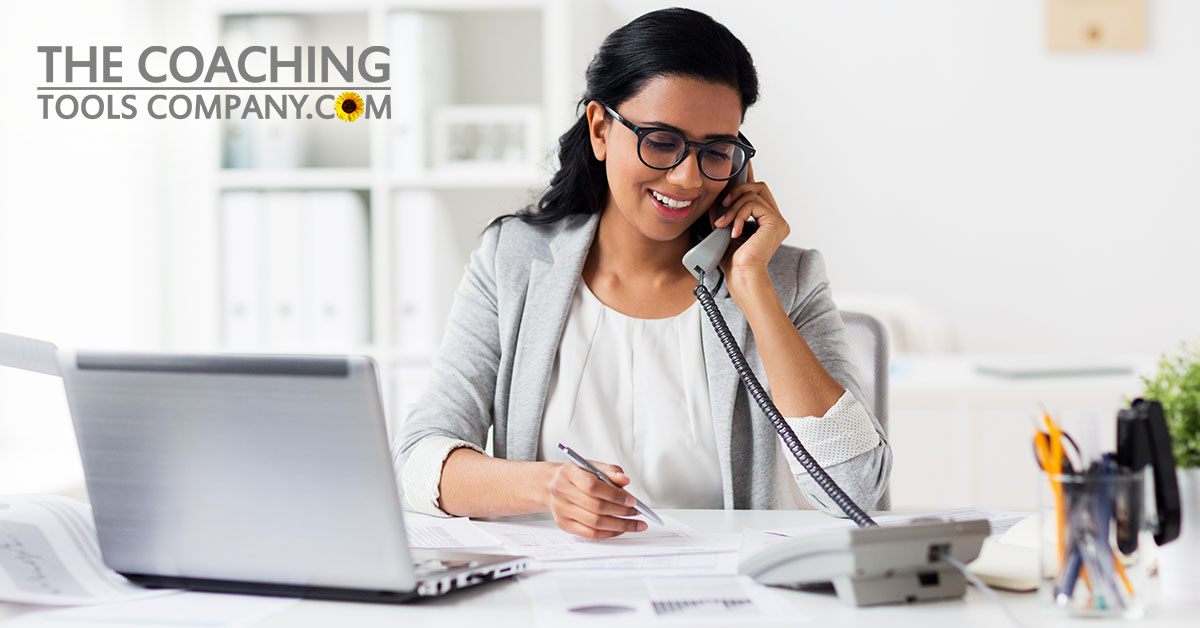 Client at desk working remotely setting goals