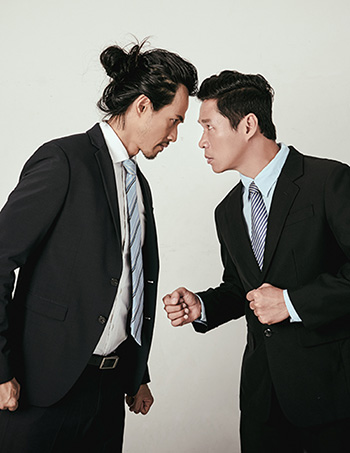 Two Businessmen Annoyed by Each Other for Reflections Coaching Tool